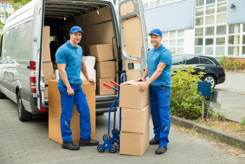 Unloading household items into a new property during a local move