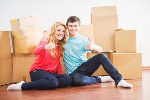 Local moving team loading furniture for a Thehyde property